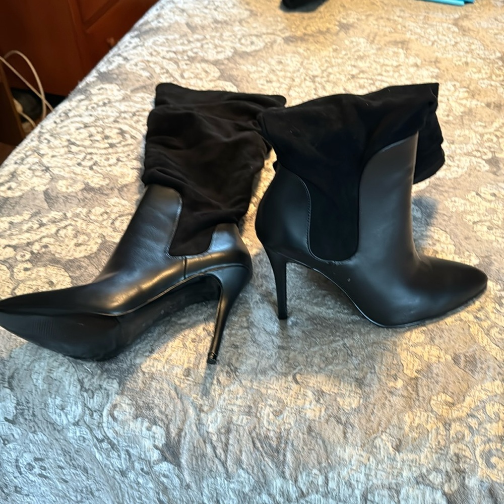 Knee high boots. New!